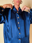 Camicia in raso di seta blu con nastro al collo “Yves Saint Laurent”