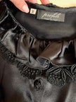 Camicia in raso di seta nero con rouches e bottoni gioiello