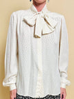 Camicia in seta Jaquard avorio con grande fiocco al collo