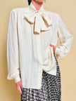 Camicia in seta Jaquard avorio con grande fiocco al collo