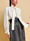 Camicia in seta Jaquard avorio con grande fiocco al collo