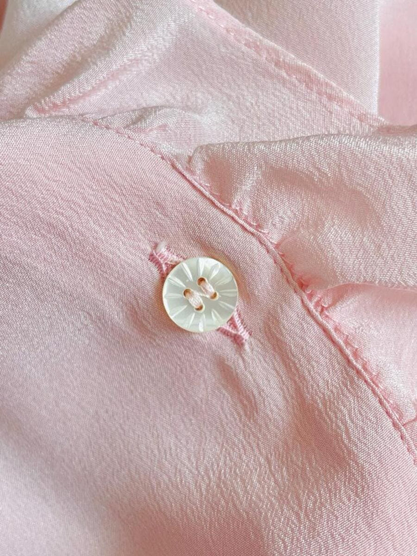 Camicia in seta rosa pastello con ruches 