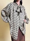 Camicia oversize con fiocco al collo fango e nera