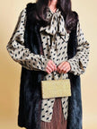 Camicia oversize con fiocco al collo fango e nera