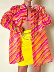 Camicia oversize in organza a righe nei toni del fucsia e arancione “Nina Ricci”