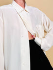 Camicia oversize in seta avorio con abbottonatura asimmetrica “Gigi Pary”