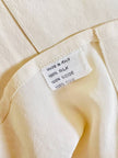 Camicia oversize in seta avorio con abbottonatura asimmetrica “Gigi Pary”