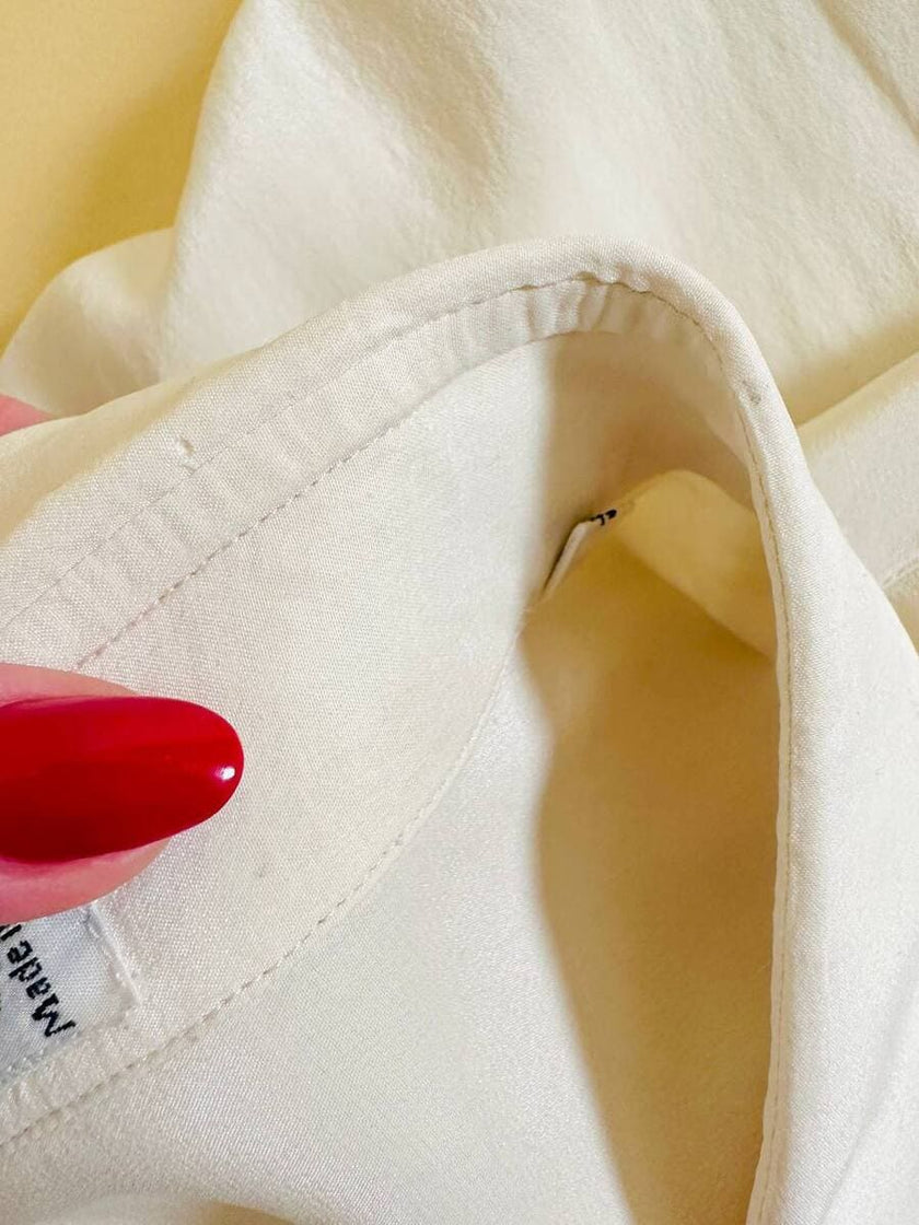 Camicia oversize in seta avorio con abbottonatura asimmetrica “Gigi Pary”