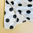Camicia in raso bianco a pois neri