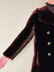 Cappotto doppiopetto in montone rasato rosso marrone