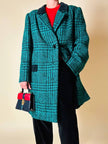 Cappotto sartoriale in lana bouclé verde e nero fantasia principe di Galles