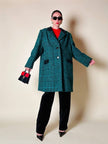 Cappotto sartoriale in lana bouclé verde e nero fantasia principe di Galles