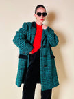 Cappotto sartoriale in lana bouclé verde e nero fantasia principe di Galles