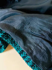 Cappotto sartoriale in lana bouclé verde e nero fantasia principe di Galles