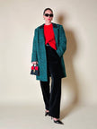 Cappotto sartoriale in lana bouclé verde e nero fantasia principe di Galles