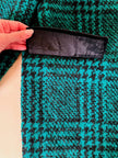Cappotto sartoriale in lana bouclé verde e nero fantasia principe di Galles