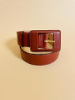 Vintage cognac leather belt with leather-wrapped rectangular buckle