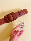 Vintage cognac leather belt with leather-wrapped rectangular buckle