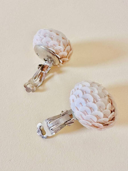 Clip a bottone in paillettes bianche