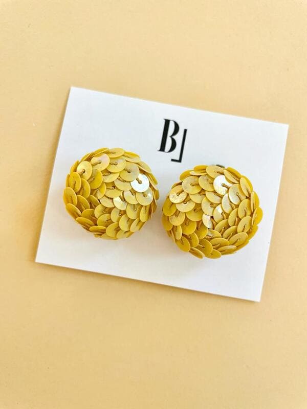 Button clip in paillettes giallo crema