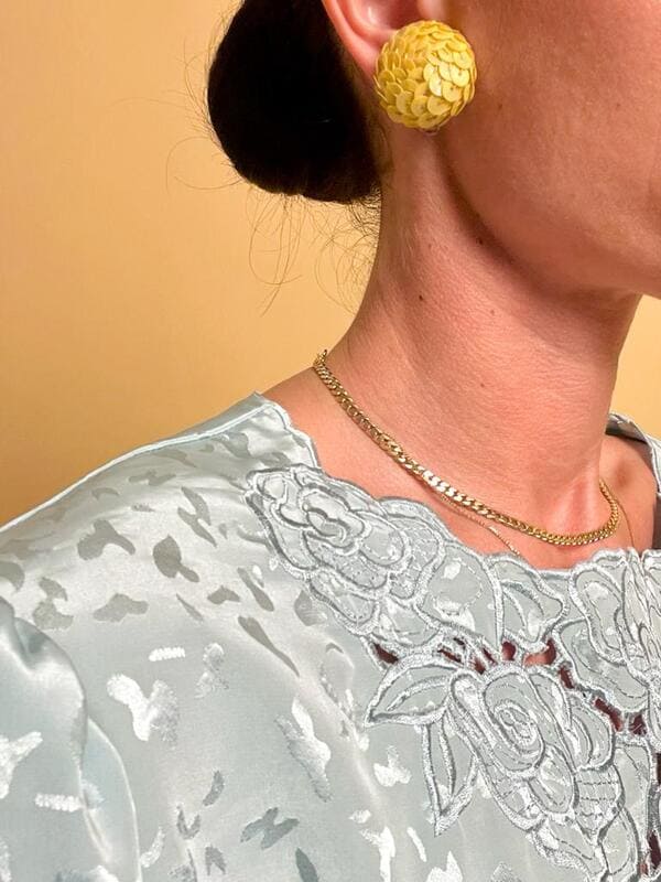 Button clip in paillettes giallo crema