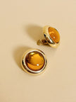 Maxi clip a bottone oro con pietra sintetica color ambra