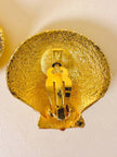 Clip dorate a forma di capasanta 