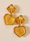 Clip pendenti a forma di cuore oro e corallo “Yves Saint Laurent”
