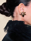 Clip dorate con cuore e iniziali YSL 