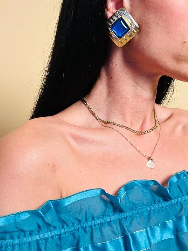 Maxi clip oro con pietra blu