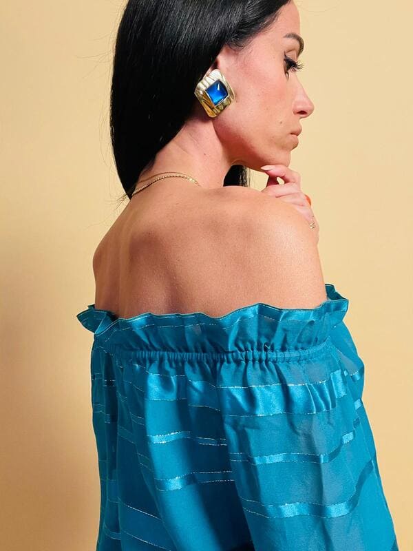 Maxi clip oro con pietra blu