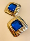 Maxi clip oro con pietra blu