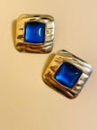 Maxi clip oro con pietra blu