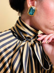 Clip oro con grande strass verde marino