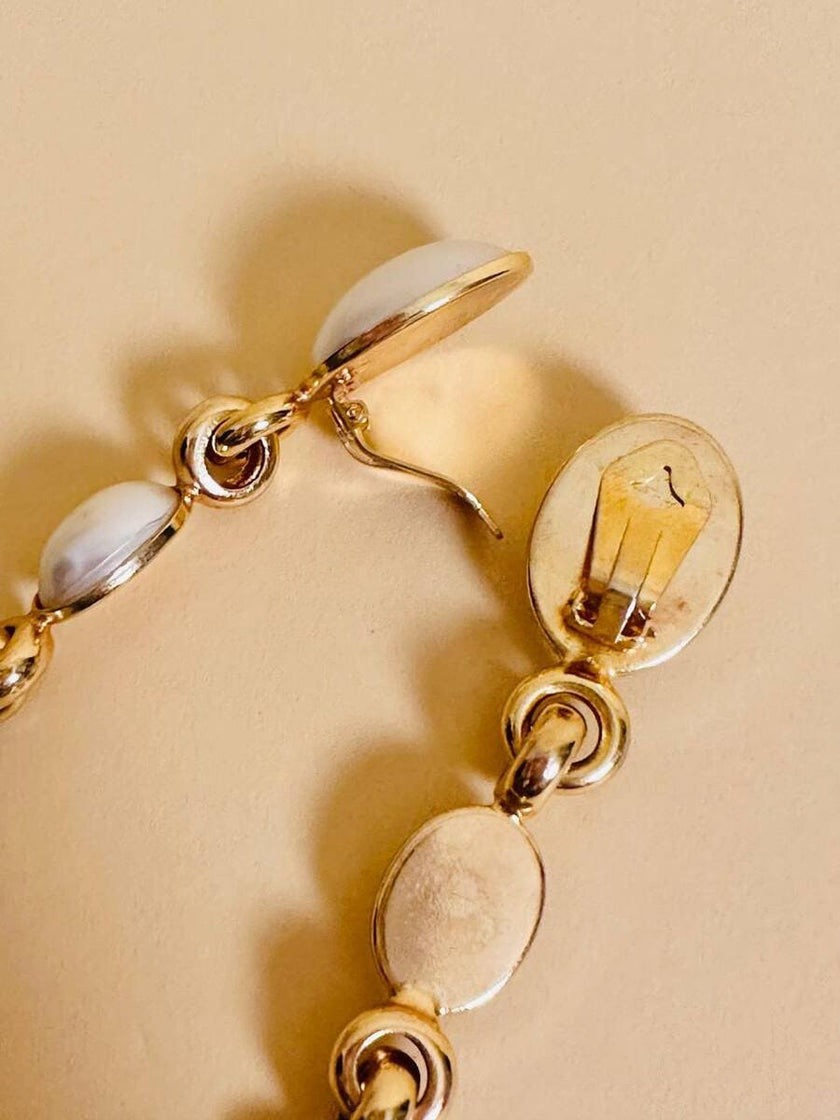 Clip pendenti con perle cabochon e strass rossi