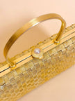 Clutch in metallo oro con motivo a intreccio