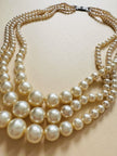 Collana di perle degradè a tre fili