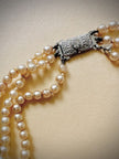 Collana di perle degradè a tre fili