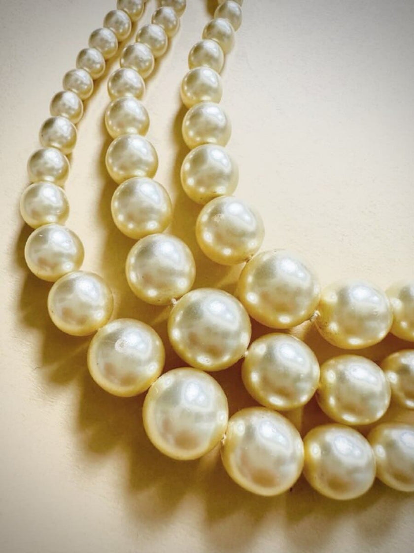 Collana di perle degradè a tre fili