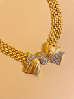 Gold-toned necklace with maxi bow