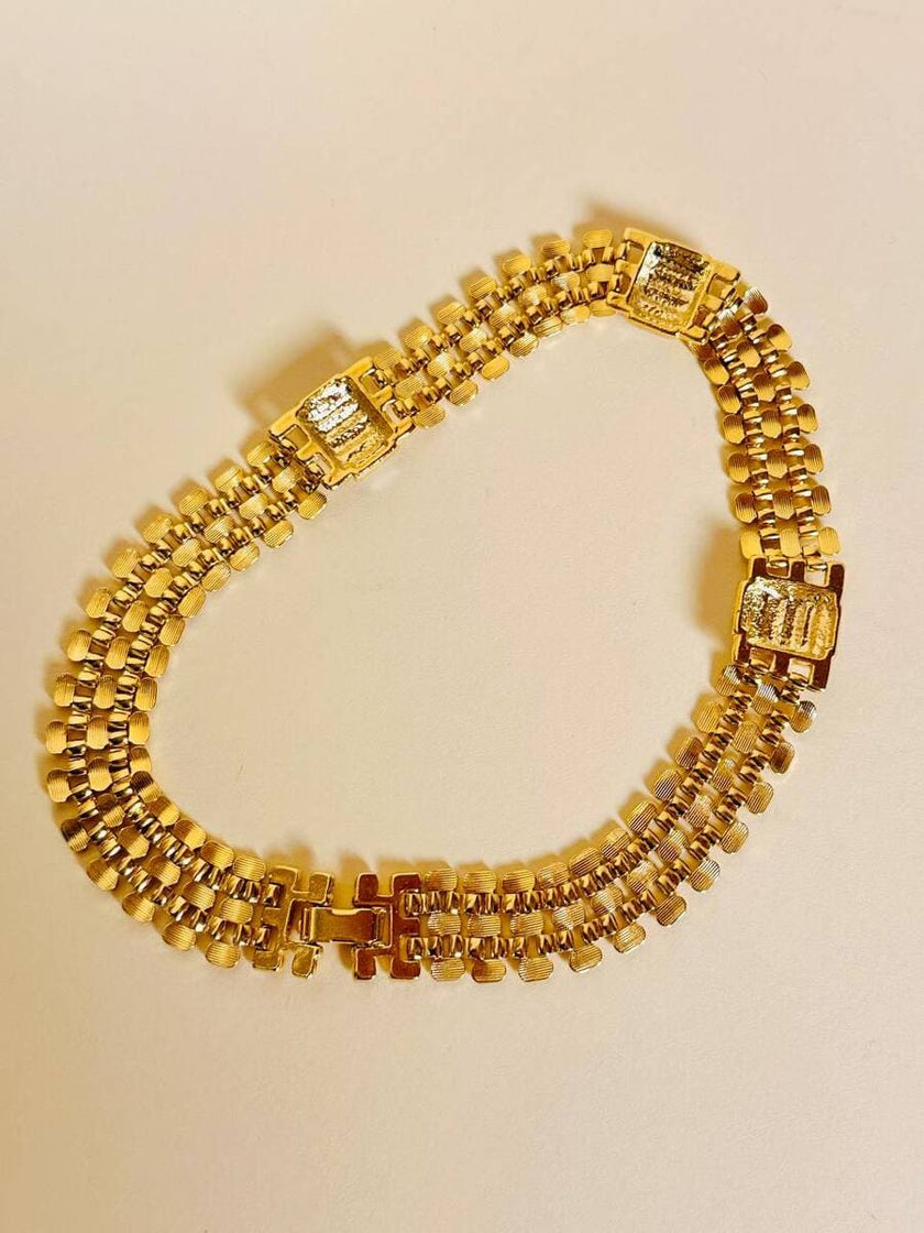 Collier in maglia metallica oro con cristalli incastonati
