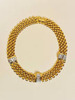 Collier in maglia metallica oro con cristalli incastonati