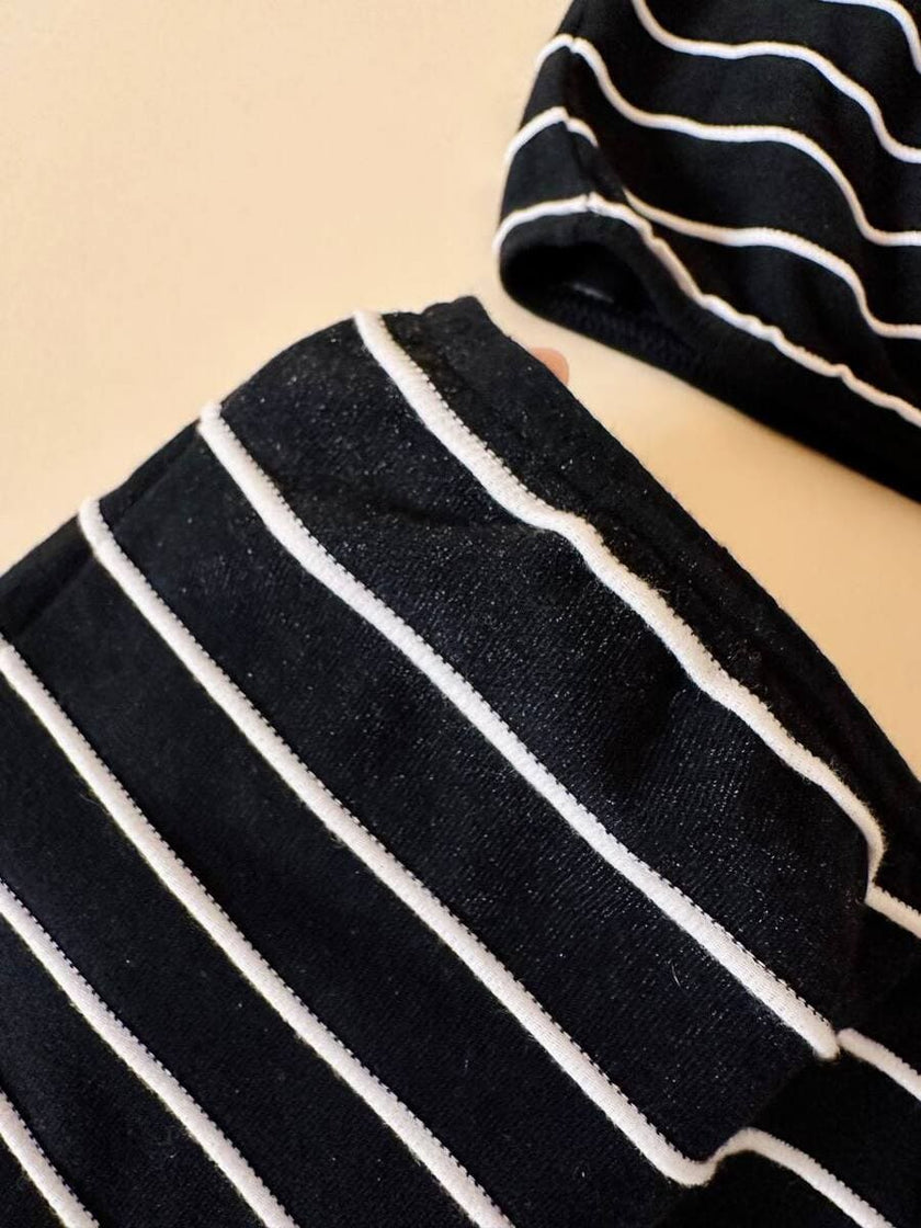 Completo nero a righe bianche “Yves Saint Laurent”