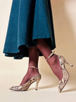 Décolleté in pitone roccia “Walter Steiger”