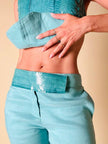 Ensemble top/pantalone turchese in lino e whips “Paola Frani”