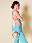 Ensemble top/pantalone turchese in lino e whips “Paola Frani”