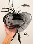 Fascinator in tulle nero e piume