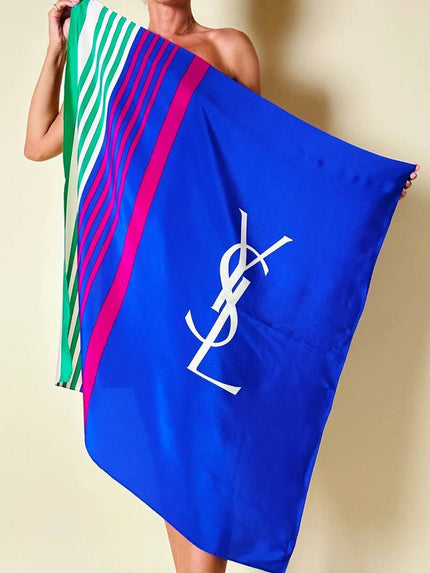 Foulard in seta multicolor con maxi logo “Yves Saint Laurent”