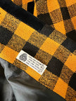 Giacca in lana fantasia damier giallo e nero con riporti di velluto “C’est Commeca”