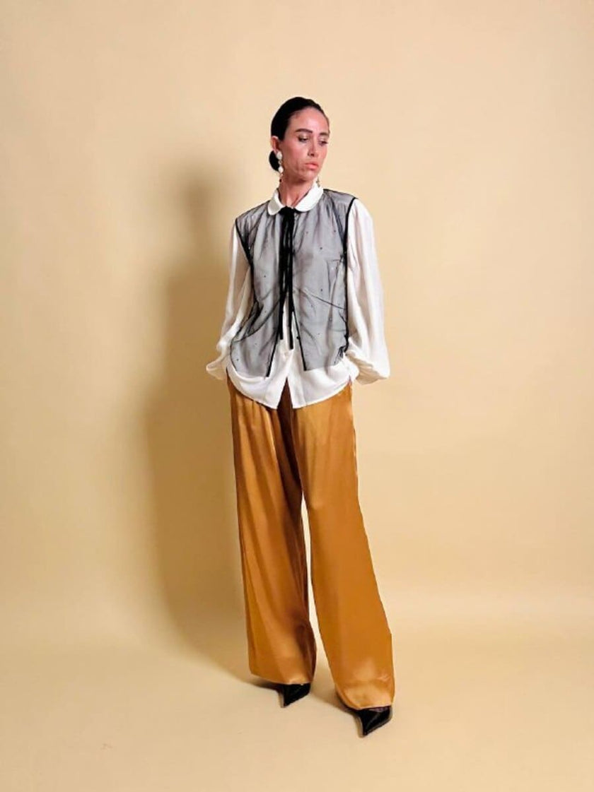 Pantalone a palazzo in cady lucido color ambra 